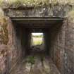 View of access to WW2 Nissen Hut magazine W30 through its reused WW1 blast mound