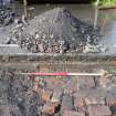 Trial Trench Evaluation photograph, Shot of concrete wall [1010], Salamander and Baltic Street, Leith, Edinburgh