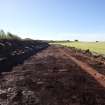 Watching Brief photograph, Film 1, General view of stripped area parallel to the Forthie Water to rear of petrol station, Taken from N, Fiddes Electricity Cable Route, Stonehaven