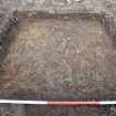 Excavation photograph, TP8 showing clay and stone subsoil with plough marks, Nethermills, Crathes, Aberdeenshire