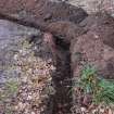 Watching Brief photograph, Trench under road to existing pole, Knock Hill House, Glenbervie, Aberdeenshire