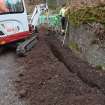 Watching Brief photograph, Trench at rounded corner of graveyard, Knock Hill House, Glenbervie, Aberdeenshire