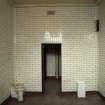 Cell Block. First floor Cell showing WC, ventilation grille and lighting recess with door open