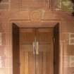 Careston Parish Church.  Porch.  View of entrance and 1905 inscription commemorating the restoration paid for by Mrs Campbell of Stracathro.