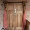 Careston Parish Church.  Nave.  View of interior entrance door.