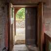 Careston Parish Church.  Nave.  View of main entrance through to porch.