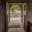 Careston Parish Church.  Nave.  View of main entrance through to porch.