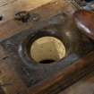 Interior. Gun Deck. Detail view of one of two navel/hawse pipes. These fed the capstan chain into the chain locker in the Orlop