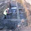 Excavation photograph, Working shots of troughs in Area A, 396-410 Gorgie Road, Edinburgh