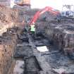 Excavation photograph, Working shots of troughs in Area A, 396-410 Gorgie Road, Edinburgh