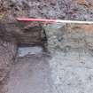 Excavation photograph, NE facing section through Trough 039, 396-410 Gorgie Road, Edinburgh