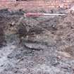 Excavation photograph, W facing section through Trough 037, 396-410 Gorgie Road, Edinburgh