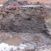 Excavation photograph, W facing section through Trough 035, 396-410 Gorgie Road, Edinburgh