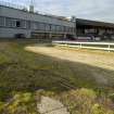 Low level image showing channel holding wire for the 'hare' with main stand in the background.