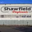 Detail of Shawfield Greyhounds sign on west face of the stadium.