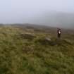 Walkover Survey photograph, Hut circle (76c) with clearance cairns in back, Cambusmore Estate, Dornoch, Highland