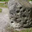 Digital photograph of perpendicular to carved surface(s), from Scotland's Rock Art Project, Heights of Fodderty, Highland