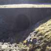 Survey photograph, North of layby 170: Concrete culvert and cut bedrock allowing stream to go under the A9, A9 Dualling - Tomatin to Moy, Highland