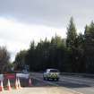 Survey photograph, General view of plantation forestry both sides of the A9 with solid steel barrier, A9 Dualling - Tomatin to Moy, Highland