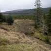 Survey photograph, South of Layby 170: Drainage ditch at the base of the south facing slope in a gap in the conifer strip, A9 Dualling - Tomatin to Moy, Highland