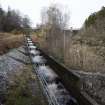 Carsfad Hydro Electric Power Station. Fish Ladder. View from south with dam and needle valve house beyond