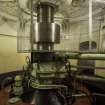 Interior. Carsfad Hydro Electric Power Station. Turbine/Power House. Generator set shaft from turbine below which will move the rotor around the fixed stator