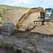 Watching Brief photograph, Working shot showing removal of interior deposit, Lyness Visitor Centre extension to Scapa Flow Museum, Lyness, Orkney