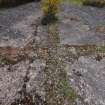 Detail of the brick foundations of the walls dividing up the interior