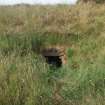 View of the partially blocked exit of the wash water gutter tunnel from the ENE (Final Wash House W30)