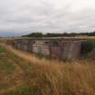 Explosives Magazine R60: view from the NW of the building nestling within its blast mound