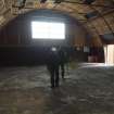 W30: Miriam McDonald (left) and Lewis Matheson (right) preparing to photograph the internal WSW gable-end of the Nissen Hut