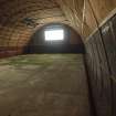 Interior, W3: view along the WSW wall to the SSE gable-end of the ammunition store