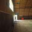 Interior, W3: view along the NNW wall of the ammunition store to the double doors close to its NE corner