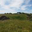 View from the NE from the NW corner of the blast wall surrounding Explosives Magazine R60 of the location of the Nitrator Separator House, which was situated on the plateau beyond the WWII Narrow Gauge Railway in the centre ground