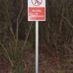 View of notice at the SSW edge of the Sulphur Store on the W side of the road