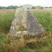 View from the N of an isolated block of probable World War 1 concrete (NY 26492 64165) showing its truncated pyramidical cross-section, with Explosives Magazine R52 in the background