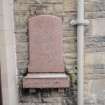 Watching Brief photograph, Detail of tombstone on church wall, Falkirk Town Centre Regeneration, Falkirk