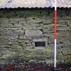 Standing Building Survey photograph, Building 1, NE wall F13, Facing SW, South-West of Slade Farm, Carmyllie, Angus