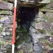 Standing Building Survey photograph, Feature F1, NE face, Void in centre with cast iron pipe, Facing SW, South-West of Slade Farm, Carmyllie, Angus