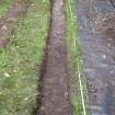 Excavation photograph, Shot after (006) removed showing track (007) taken from SE, Carzield Roman Fort, Kirkton, Dumfries