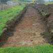 Evaluation photograph, Trench 1, Facing W, Land west of Old Kirk, Spittal of Glenshee