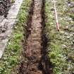 Excavation photograph, Shot of (014), detail at N end taken from NE, Carzield Roman Fort, Kirkton, Dumfries