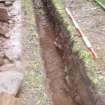 Excavation photograph, Oblique shot of possible path and wall, post-excavation taken from NE, Carzield Roman Fort, Kirkton, Dumfries