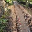 Excavation photograph, Surface (021)  taken from SE, Wellington Bridge, Carzield Roman Fort, Kirkton, Dumfries