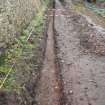 Excavation photograph, Gap between surfaces (020) and (021) of , Wellington Bridge, Carzield Roman Fort, Kirkton, Dumfries