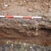 Excavation photograph, NE facing section of [022] taken from SW, Wellington Bridge, Carzield Roman Fort, Kirkton, Dumfries