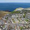 Oblique aerial view from south-west showing Mid- to Late C20 (Deanhead), Mid- to Late C20 (Barefoots) and Recreation (Holiday Park) Areas of Townscape Character, Eyemouth