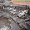 Excavation photograph, Tenement walls in NE corner, Paisley Abbey, Renfrewshire