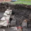 Excavation photograph, Tenement walls in NE corner, Paisley Abbey, Renfrewshire