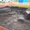 Excavation photograph, NE corner with concrete and tenement foundations, Paisley Abbey, Renfrewshire